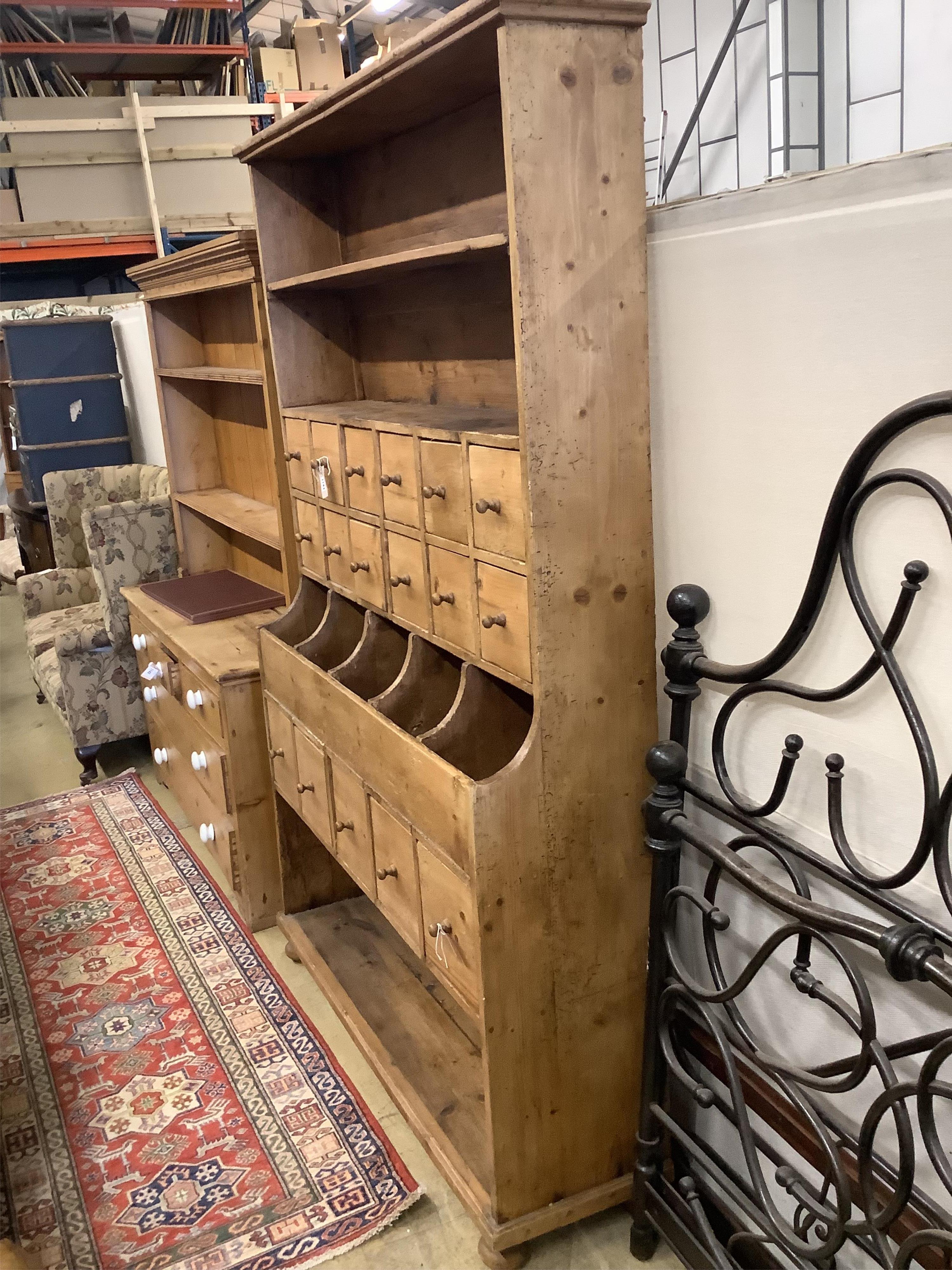 A Victorian pine grocer's shop cabinet